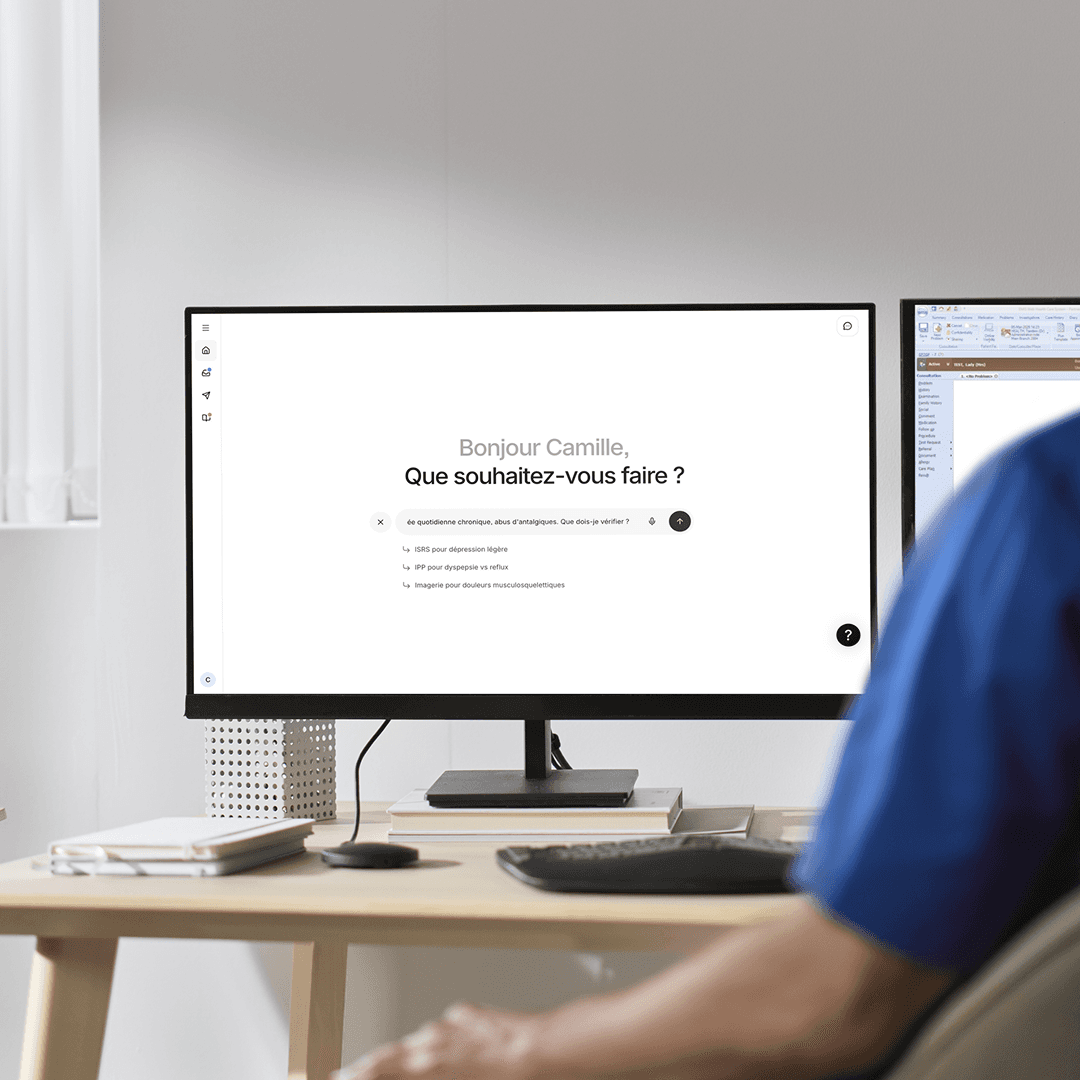 Un poste de travail et son écran — photo provisoire